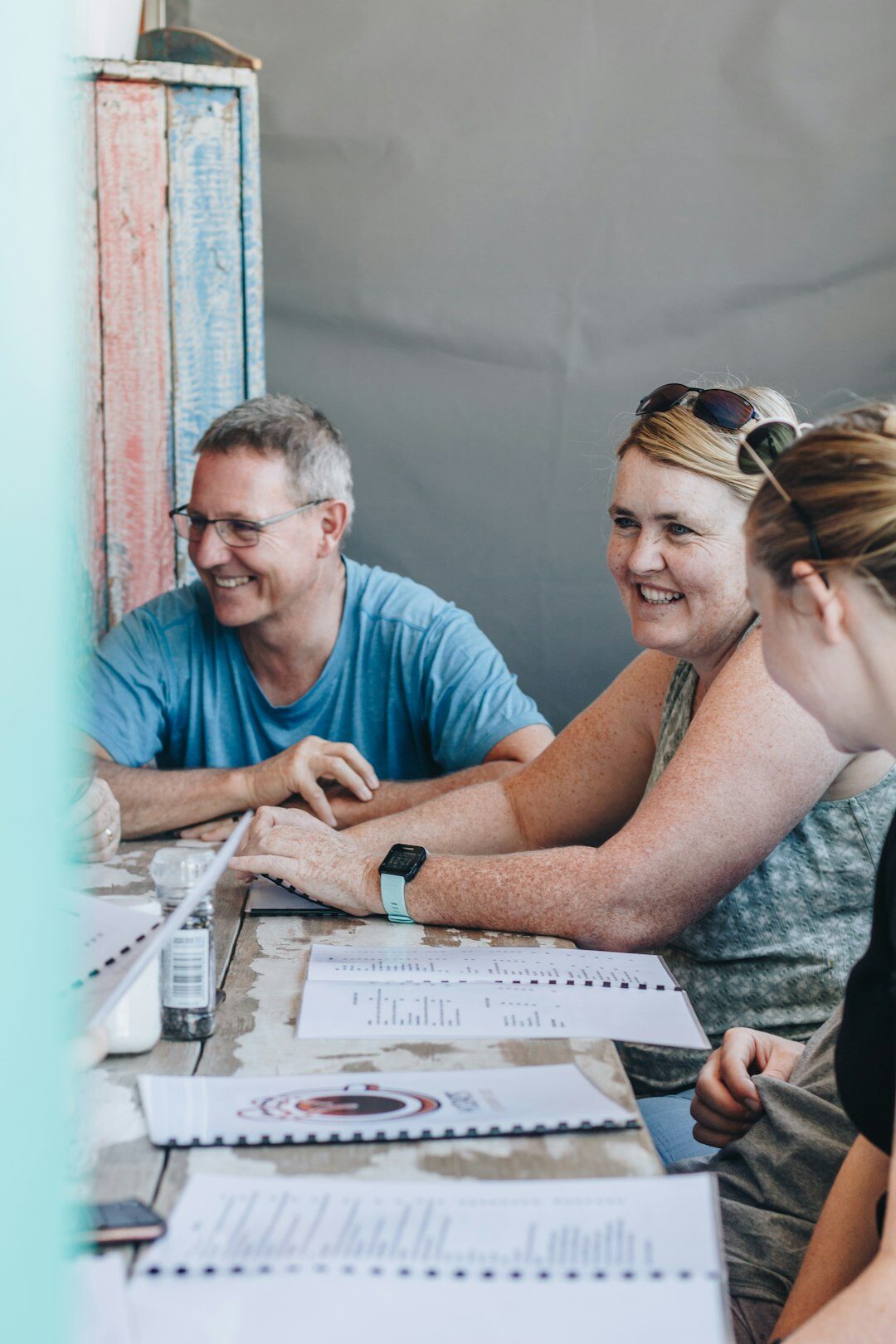 Colleagues collaborating around a table during a workshop